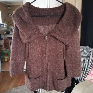 Brown zip up sweater.